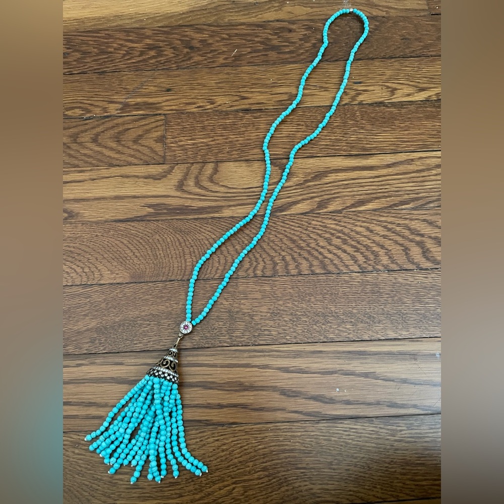 Hand beaded torqouise colored necklace with gemstones